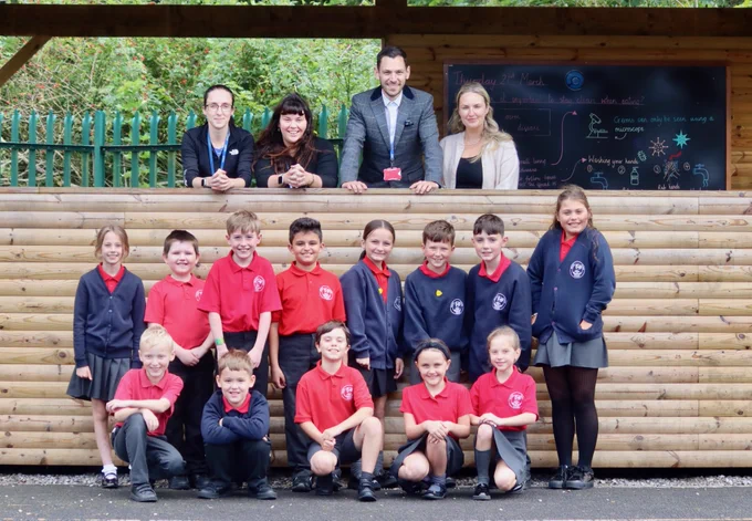 Andy with a group of pupils and teachers