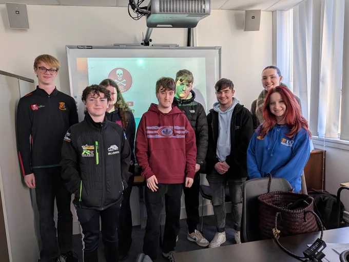 Photo of 4 secondary school students after their presentation from the presidents of UCC Clubs and Socs with Access UCC ambassador Anna and interm Cliodhna