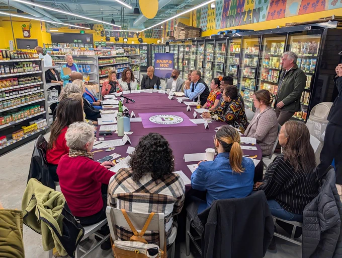 SNAP food retailers provide remarks during a roundtable discussion held by Rep. Ayanna Pressley at the Dorchester Food Co-op.