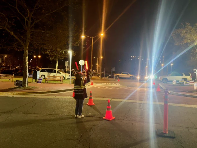 Elections staffer directing traffic
