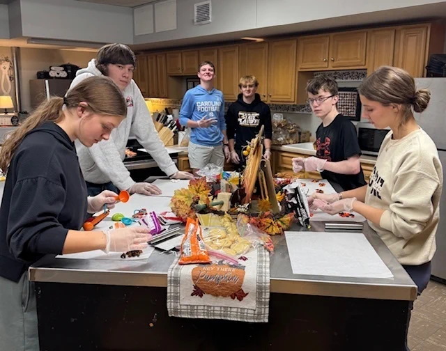 FCS students filling snack bags