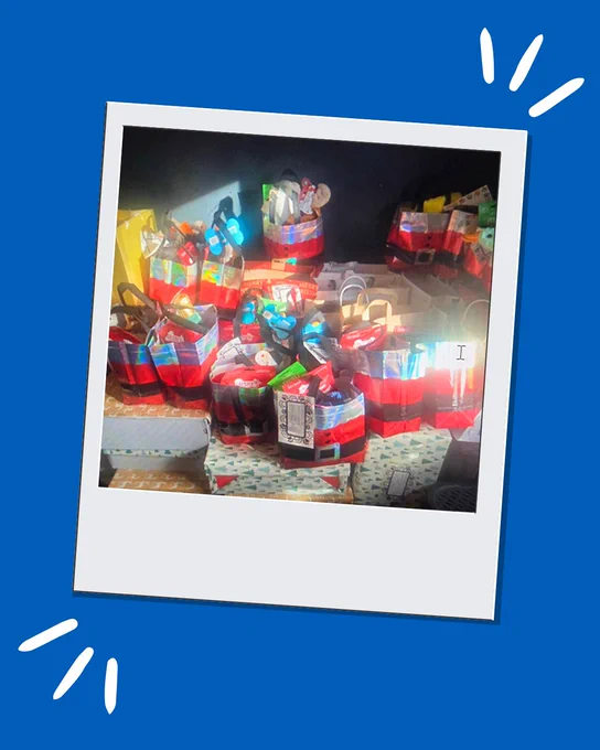 A picture of 43 shoeboxes and Santa bags filled with presents.