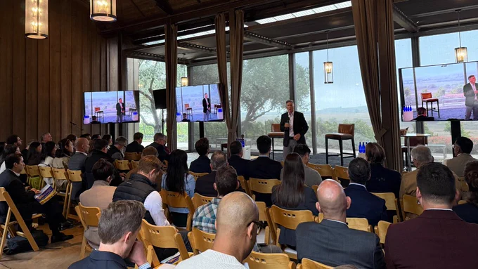 Biocom California President & CEO, Tim Scott address a full room of CEOs