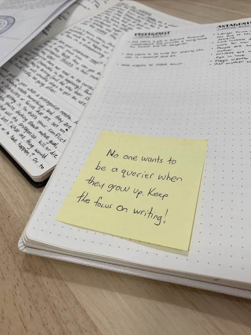 A yellow sticky note from my husband attached to my brainstorming notebook that says, “No one wants to be a querier when they grow up. Keep the focus on writing!”
