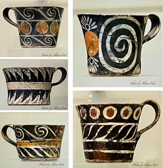 My photo collage shows 5 cylindrical Minoan cups each with single handle,  slightly flaring rim, and decorated with different geometric polychrome motif:

Top L: swirling white vine-like lines and round reddish-orange medallions framed by white circles on black background

Top R : large white spiral on front of cup with a reddish-orange oval with stylised white petals beside it, on black background

Middle L: diagonal zig-zag stripes in alternating black and white above and below a band around the middle of the cup

Bottom L : swirling white lines and reddish-orange and white geometric band on black background

Bottom R: diagonal white stripes below row of red dots outlined with white circles on black background

This type of ornamental Minoan pottery is known as Kamares Ware, named after the Kamares Cave on Mount Ida, Crete where this kind of pottery was first discovered. Luxury items produced by palace workshops at Phaistos and Knossos. Excavated at Phaistos. Dated 1800-1700 BC.