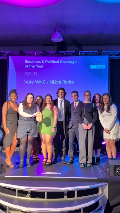 Student journalists from Northampton collect their gold award 