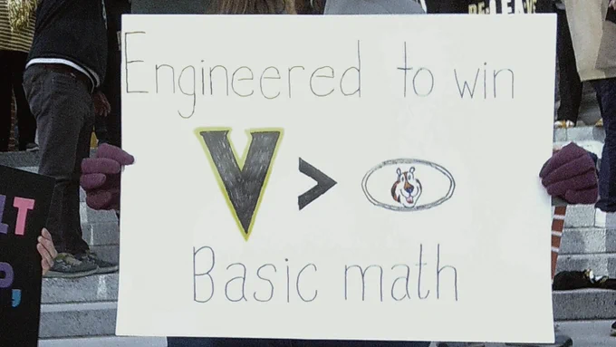 Sign reads: Engineered to Win. Vanderbilt > Missouri. Basic Math. 