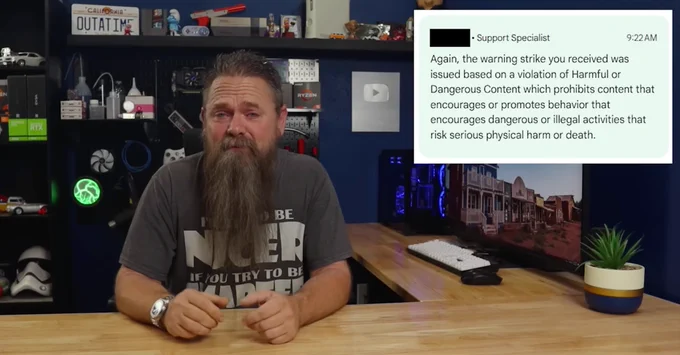 YouTube video screenshot of user CyberCPU Tech sitting at his desk with a screenshot floating next to him. It reads: 

Again, the warning strike you received was issued based on a violation of Harmful or Dangerous Content which prohibits content that encourages or promotes behavior that encourages dangerous or illegal activities that risk serious physical harm or death.