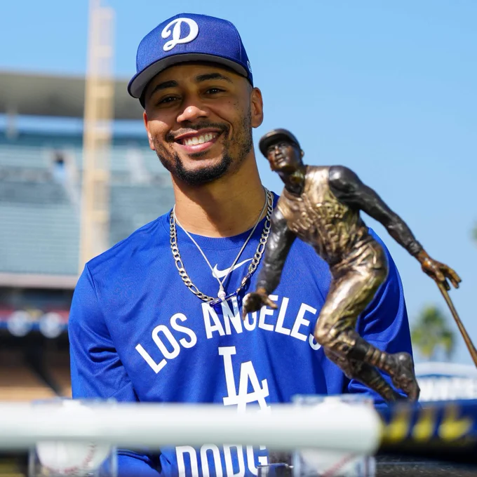 Mookie Betts smiles ahead of Game 3 of the World Series with the Roberto Clemente Award.