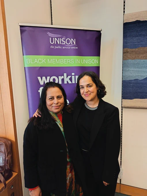 Photo of Santosh Dass and Nadia Whittome MP in front of Unison Black Members in Unison banner.