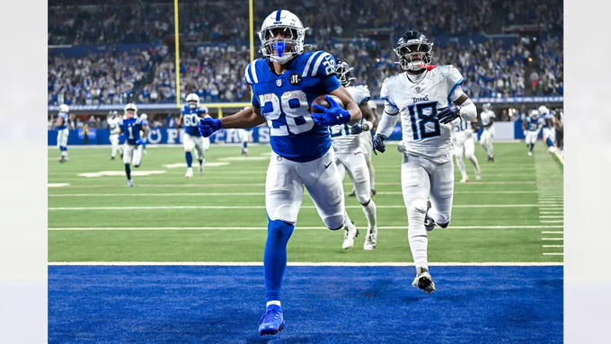 Indianapolis Colts RB #28 Jonathan Taylor scores a touchdown during a Week Eight game against the Tennessee Titans 