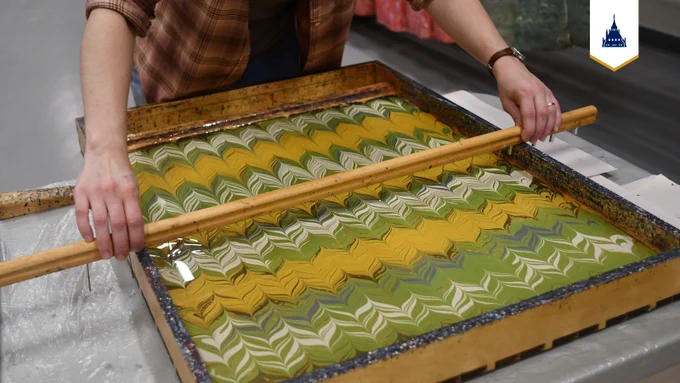 Paper in a marbling bath.