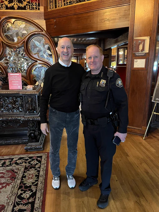 Chief in restaurant with owner