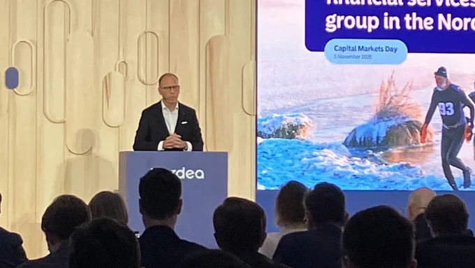 CEO Frank Vang-Jensen on stage in London. 