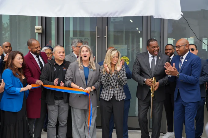 Elected officials cutting the ribbon for the new Kew Gardens Community Center. 