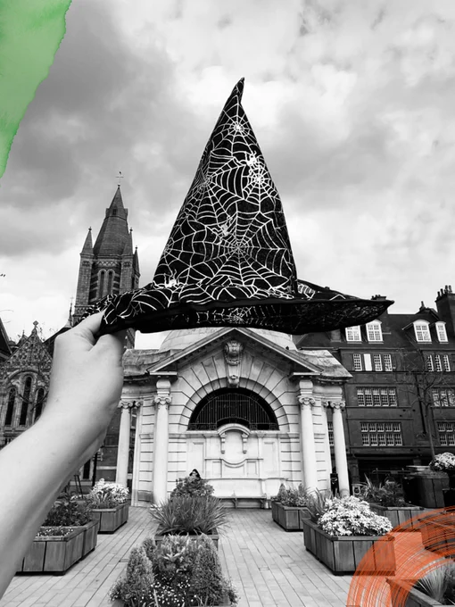 Duke Street substation, photographed in black and white. A witches hat is held up in the photo, and green and orange elements have been added to the picture.