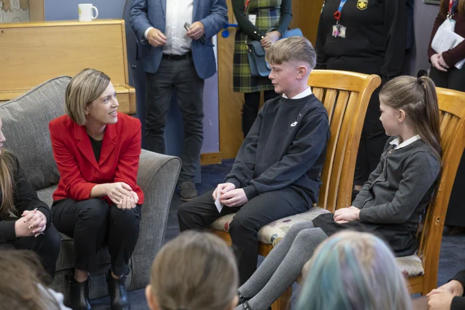Education Secretary Jenny Gilruth  speaks with pupils and parents at Pathhead Primary School  during the launch of a national attendance campaign and resources on Parent Club.