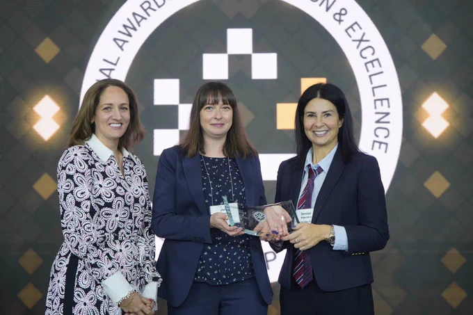 Picture provided by CCPPP, Jen Simon, Vice President of Capital Redevelopment and Support Services accepting Gold Award.