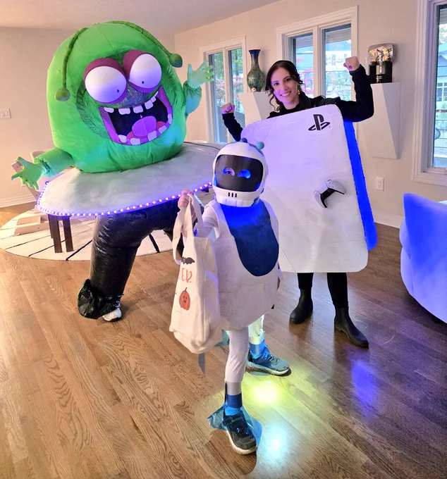 MatPat, Steph, and Ollie in Astro Bot-themed Halloween costumes 
