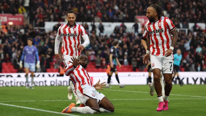Junior Tchamadeu slides onto his knees to celebrate after scoring in Stoke City's 5-1 win over Bristol City.
