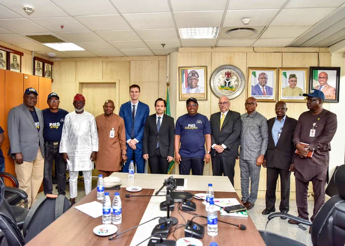 The Permanent Secretary, MPR. Dr. Vitalis Emeka Obi mni (5th right) in a group photograph with IMF delegation, Directors of Technical Departments in  MPR, NUPRC and NMDPRA during the climate policy meeting in Abuja.