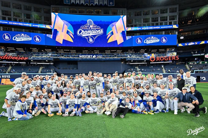 A photo of the team on the field after winning the World Series.