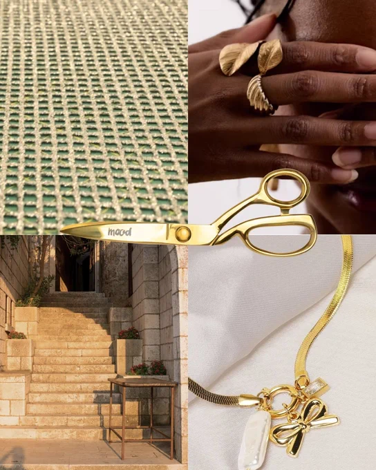 A collage of gold and earthy tones. The focus is a pair of elegant, sharp gold Dressmaker's Shears engraved with "mood," alongside a hand modeling gold leaf-shaped rings, a stone staircase, and a gold snake chain necklace with a pearl and bow charm.