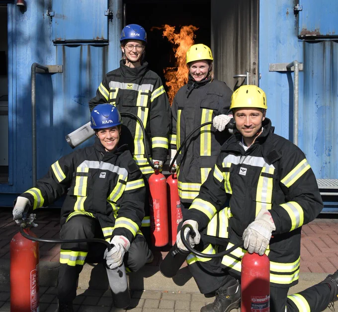 Members of ESA’s astronaut reserve Carmen Possnig, Meganne Christian, Anthea Comellini and Arnaud Prost in full training gear during a fire emergency drill. 