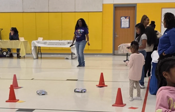 Families maneuvered Rovers (RVR  ) to complete a maze at the STARBASE Station