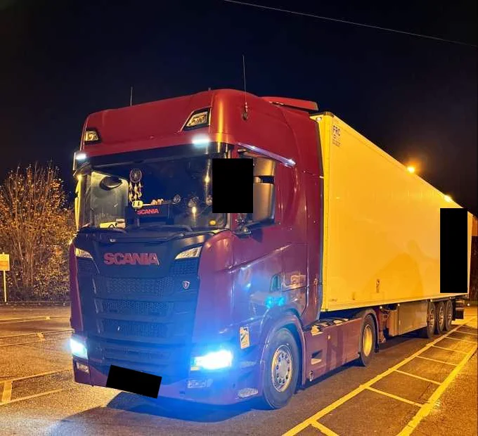 Heavy goods vehicle with a driver found to be using 2 cards to conceal driver hours offences 