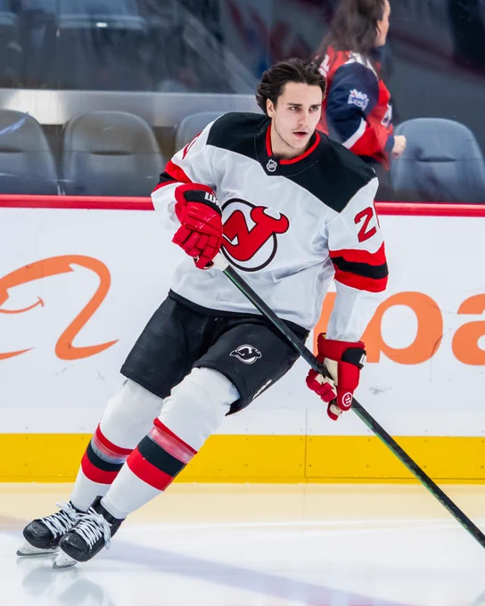 Shane Lachance warming up on ice in a Devils uniform.