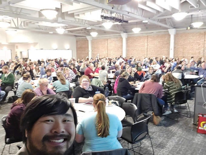 Selfie of me with around 200 people in the background.