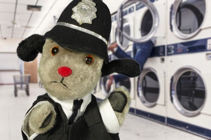 PC Sweep in the illicit laundrette.