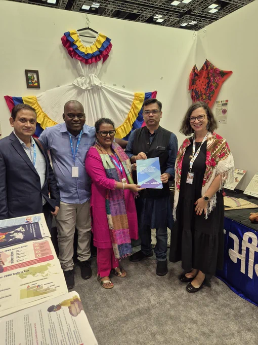 The Inclusivity Project at World Social Summit, Doha meeting CEO Amitabh Behar for Oxfam International and Jonathan Passmoor Permanent Mission of South Africa. The Inclusivity Project and Global Forum for Communities Discriminated on Work and Descent (CDWD) show their Policy brief for CDWD created in collaboration with UN Women.