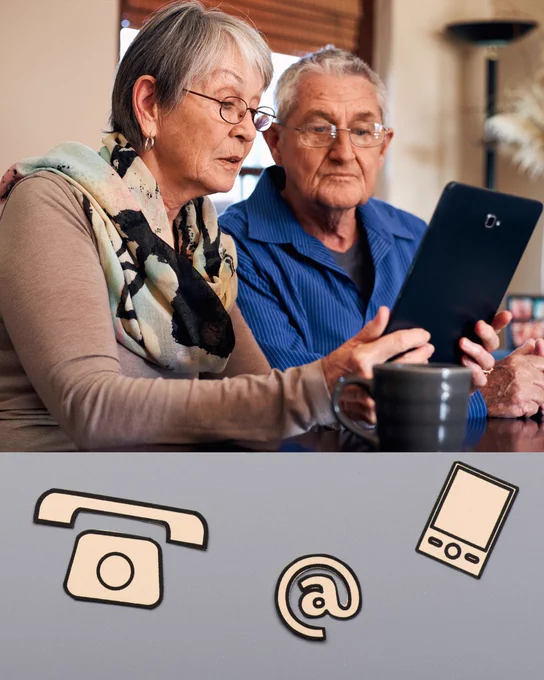 A woman holding a tablet with her husband next to her on a table with a hot drink to the side of them. On a grey background at the bottom with a telephone graphic and @ sign and a tablet graphic.