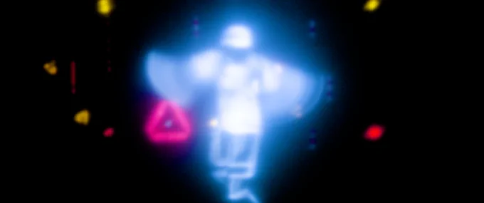 an angelic glow of a fully retroreflective outfit against a wall of reflectors