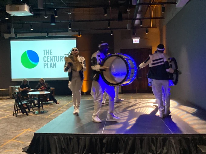 This is a photo of a drumline performing at the CMAP State of the Region Event.