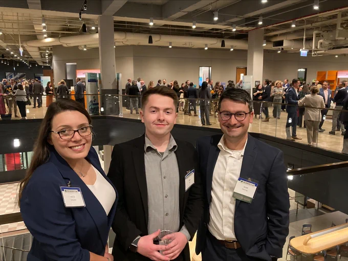 This is a photo of McHenry County Director of Public Affairs Alicia Schueller, Assistant County Engineer Scott Hennings, and Administrative Intern Alex Wall at the CMAP State of the Region Event.
