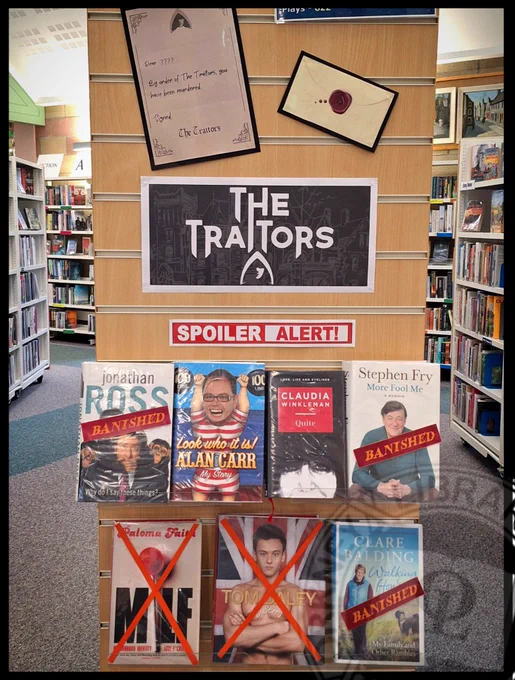 A display of books by or about some of the celebrities who appeared in Celebrity Traitors