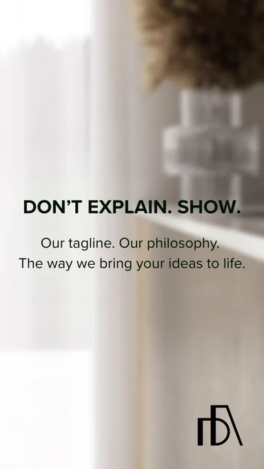 Minimalist background with soft light and text “Don't explain. Show.” Brand tagline.