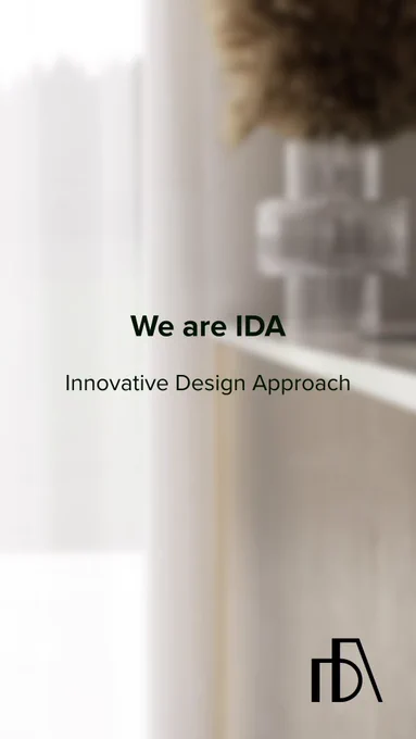 Minimalist background with soft light and text “We are IDA – Innovative Design Approach.” Elegant brand introduction visual with neutral tones.