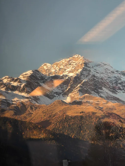 Swiss Alps through bright sunshine