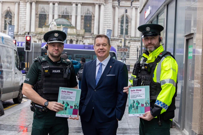 Photo caption – Superintendent Allister Hagan (pictured left) and Constable Owen Kelly (right) from the Police Service of Northern Ireland and Retail NI Chief Executive Glyn Roberts launch the national week of action on business crime, with a series of Safer Business Action Days across Northern Ireland.