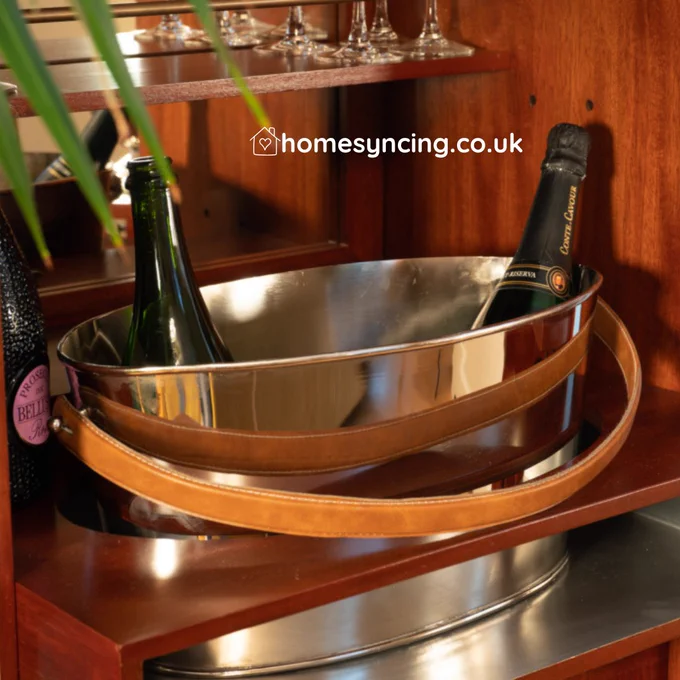 champagne cooler.
Aluminium and leather strap.
homesyncing.co.uk