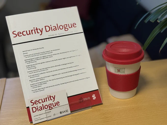 Security Dialogue Special issue displayed on a display shelf
