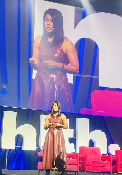 Mary Varghese Presti on stage. 