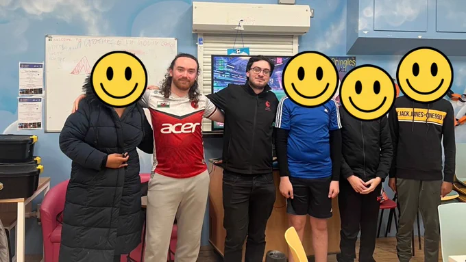 A group of people standing together.