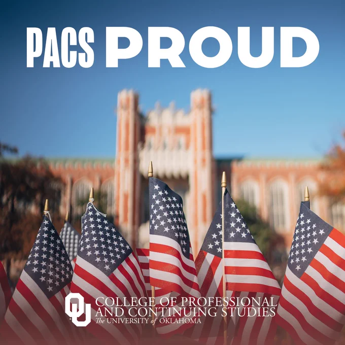 An image featuring multiple American flags in the foreground with a blurred university building in the background. Text at the top reads 'PACS PROUD'. 