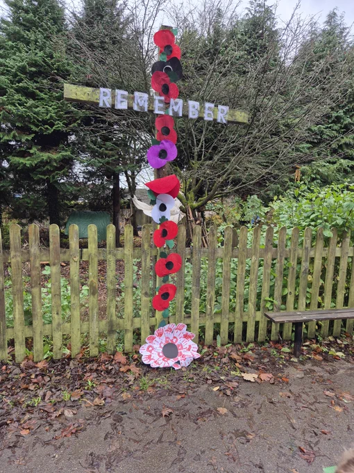 Cross covered with poppies