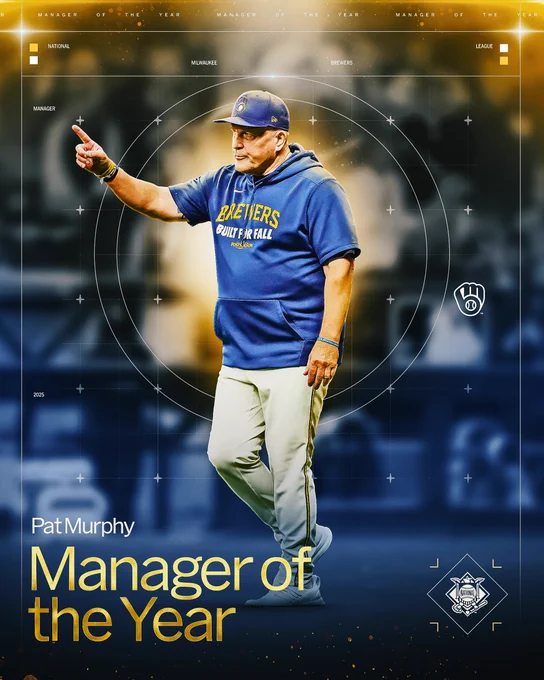 2025 National League Manager of the Year: Pat Murphy, Milwaukee Brewers
Pictured: Pat Murphy gestures to the bullpen while wearing a dark blue Milwaukee Brewers hoodie and cap.